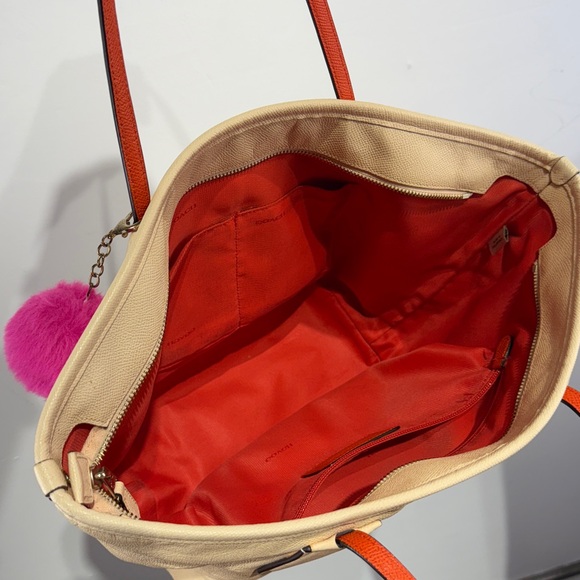 Coach Peach/Cream Tote with Pink Pom Pom - Picture 6 of 7